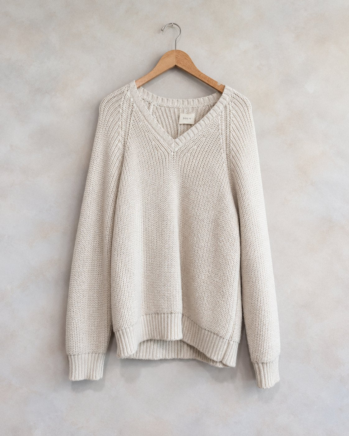 DOEN, Alpaca V Neck Sweater, S on a wooden hanger