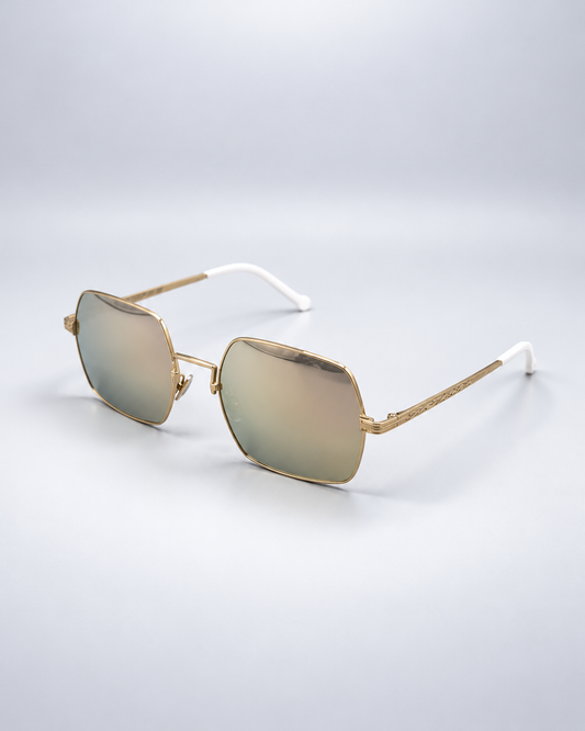Sunglasses photographed on a pale gray studio background