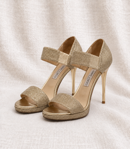 JIMMY CHOO, Gold Glitter Platform Heel, 39.5 pair facing left on ivory fabric