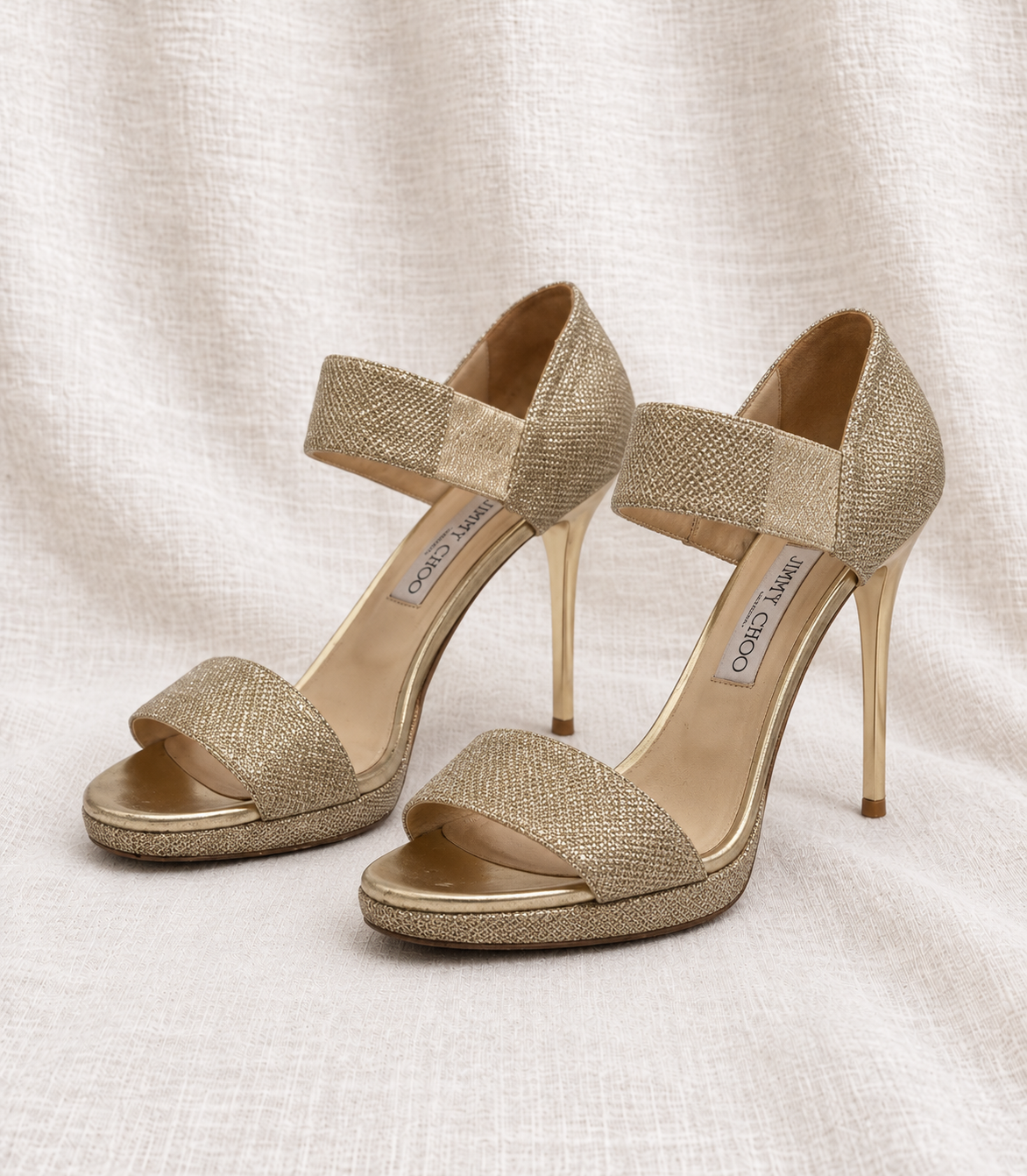 JIMMY CHOO, Gold Glitter Platform Heel, 39.5 facing left on ivory fabric