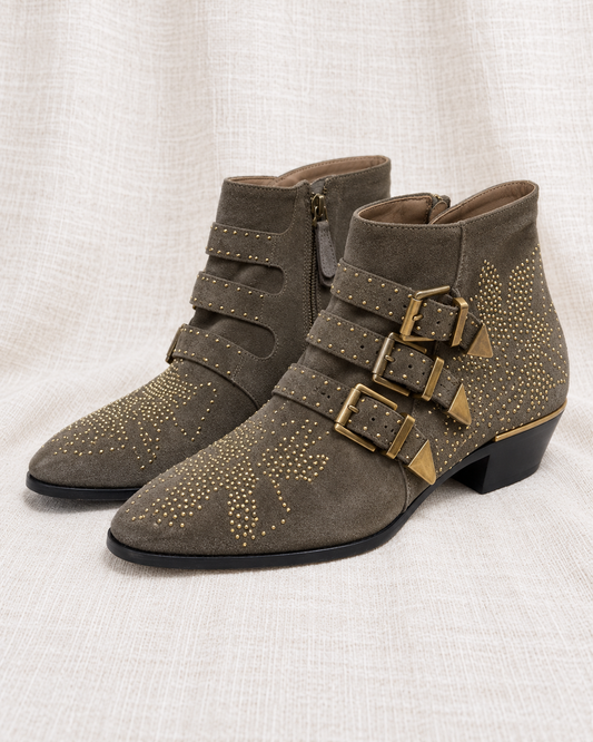 CHLOE, Susanna Boots with Gold Buckles, 38 — closely grouped left-facing pair on ivory linen