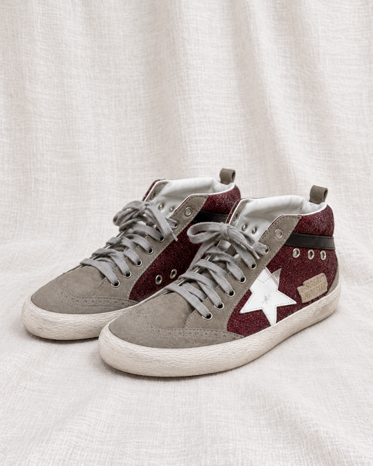 GOLDEN GOOSE, Burgundy Glitter High Tops, 36 — left-facing pair on ivory linen
