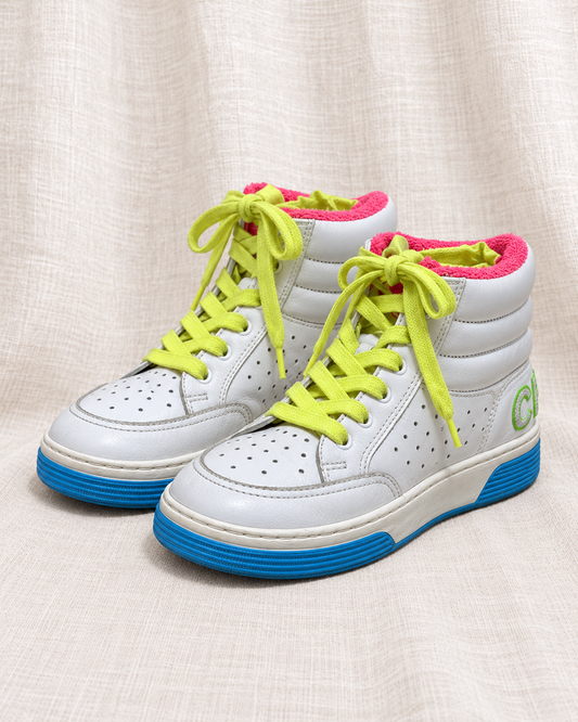 CHANEL multicolor high-top sneakers — corrected proportions and heel lettering on ivory linen