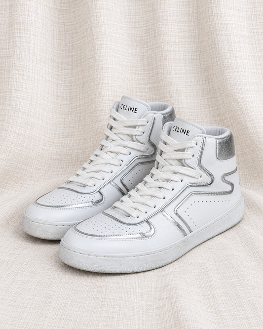 CELINE, CT-02 Leather High Top Sneakers, 36 — closely grouped left-facing pair on ivory linen