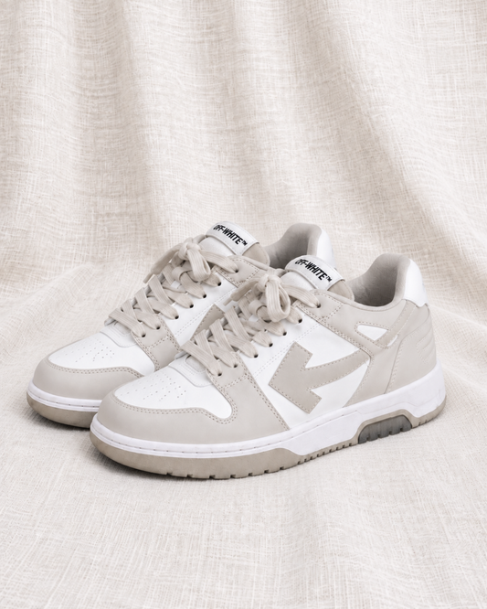 OFF-WHITE Calf Leather Sneakers — closely grouped left-facing pair on ivory linen