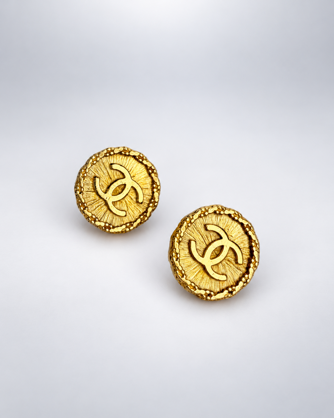 CHANEL Gold Toned Logo Clip-On Earrings