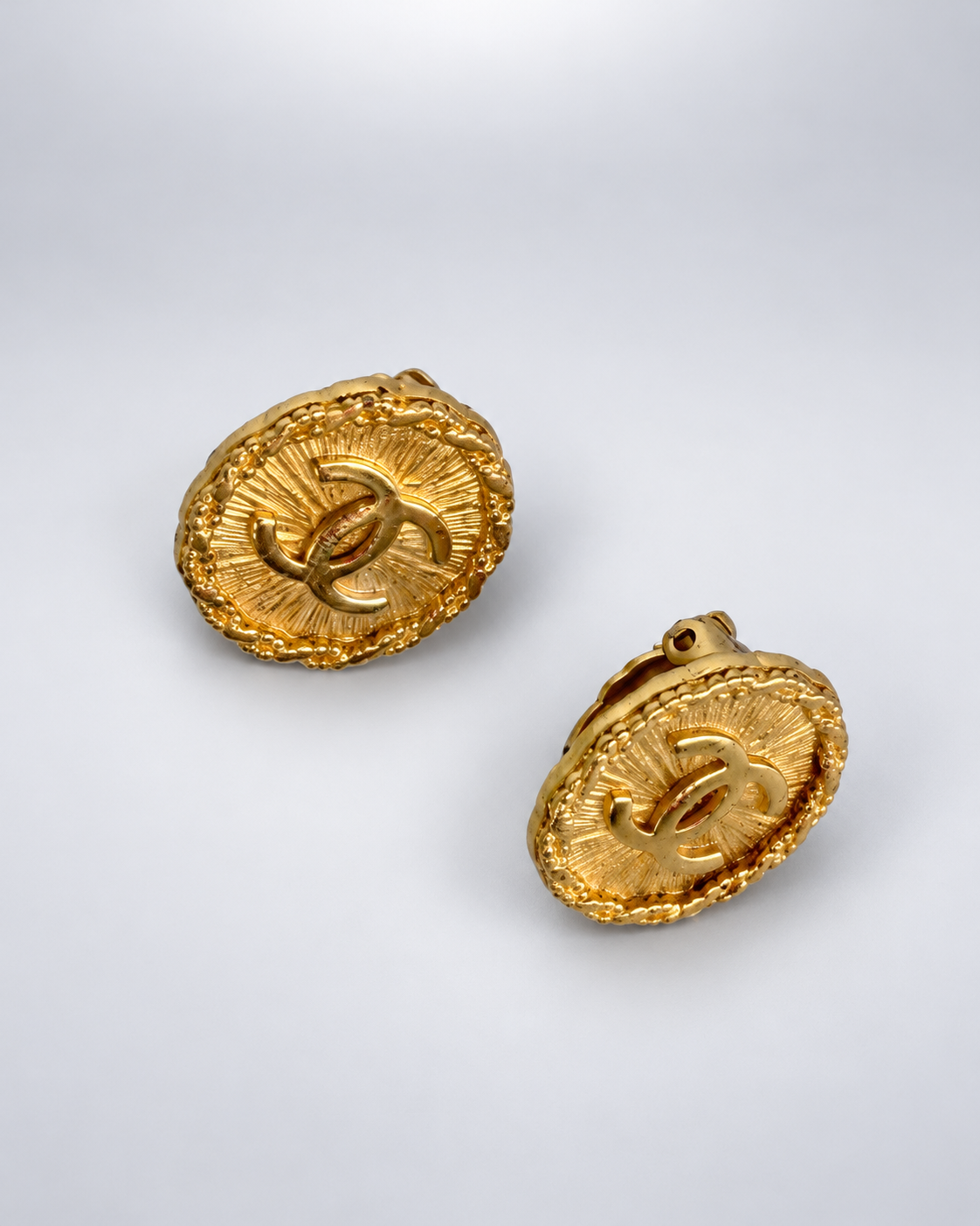 CHANEL Gold Toned Logo Clip-On Earrings