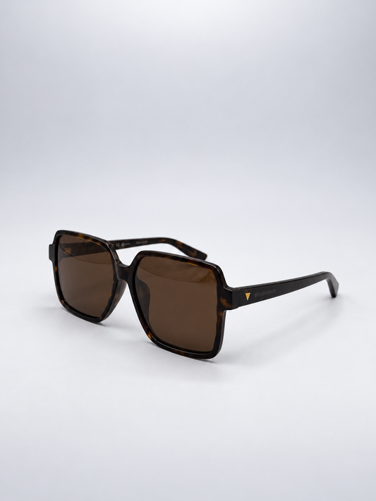 Sunglasses photographed against a soft light gray studio background