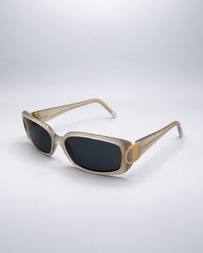 Sunglasses photographed against a soft light gray studio background