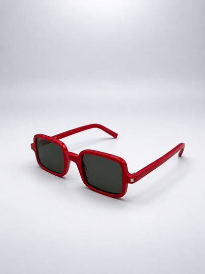 Sunglasses photographed against a soft light gray studio background