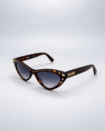 Sunglasses photographed against a soft light gray studio background