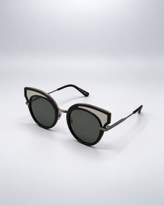 Sunglasses photographed against a soft light gray studio background
